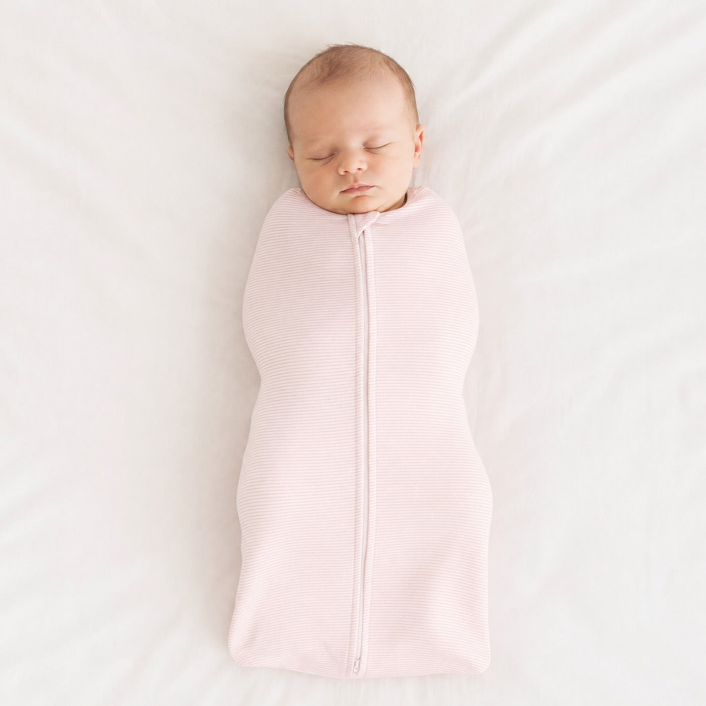 Baby asleep in the swaddle
